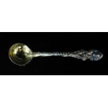 An Early 19th Century Silver Ladle with scalloped bowl and male bust finial, marks missing place and