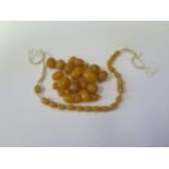 A Selection of Faux Amber Beads, 36.7g