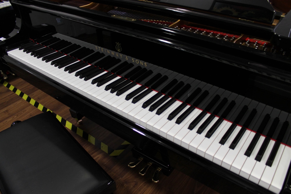 Steinway (c2015) A 6ft 11in Model B grand piano in a bright ebonised case on square tapered legs; - Image 2 of 8