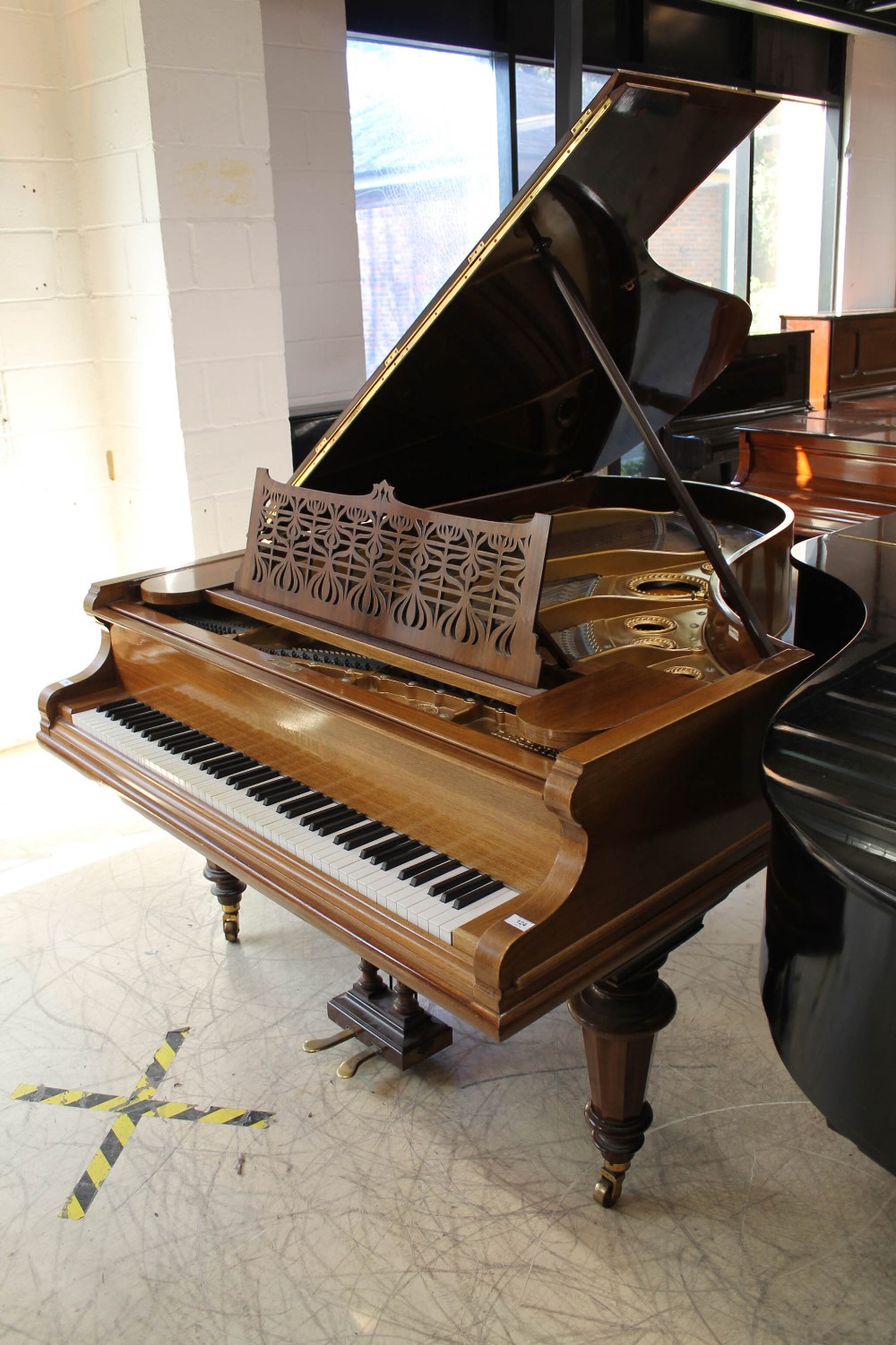 Bechstein (c1901) A 6ft 7in Model V grand piano in a rosewood case on turned octagonal legs.