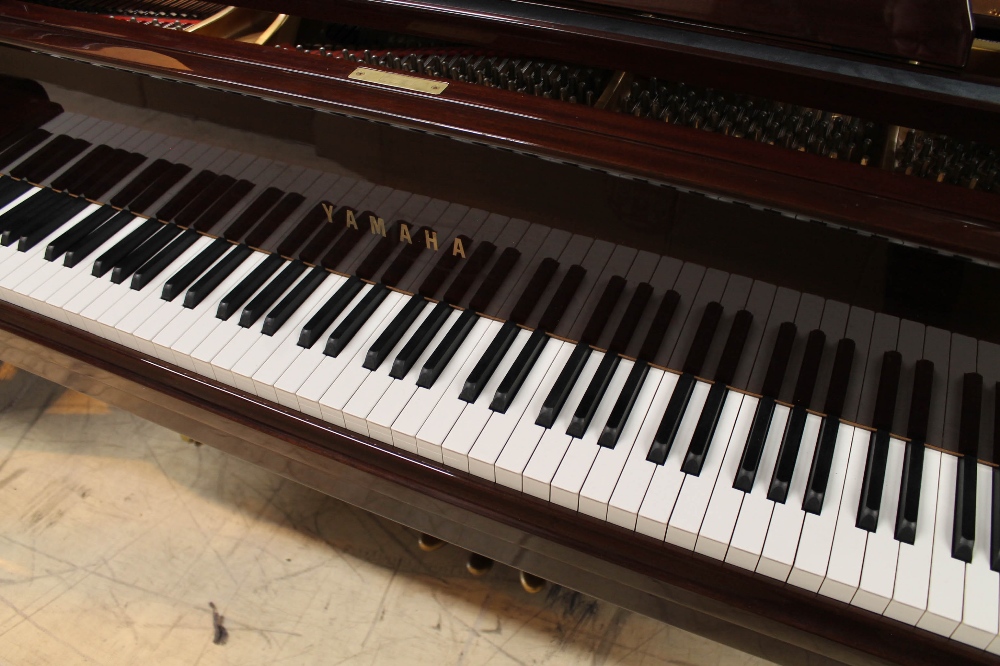 Yamaha (c2002) A 6ft 1in Model C3 grand piano in a bright mahogany case on square tapered legs. - Image 2 of 8