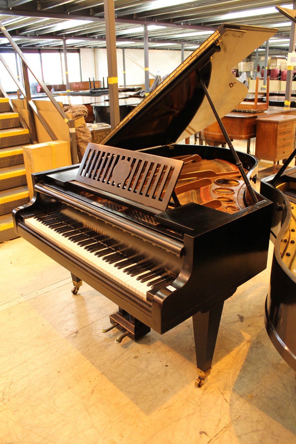 Bösendorfer (c1929) A 5ft 7in Model 170 grand piano in a mahogany case on square tapered legs.