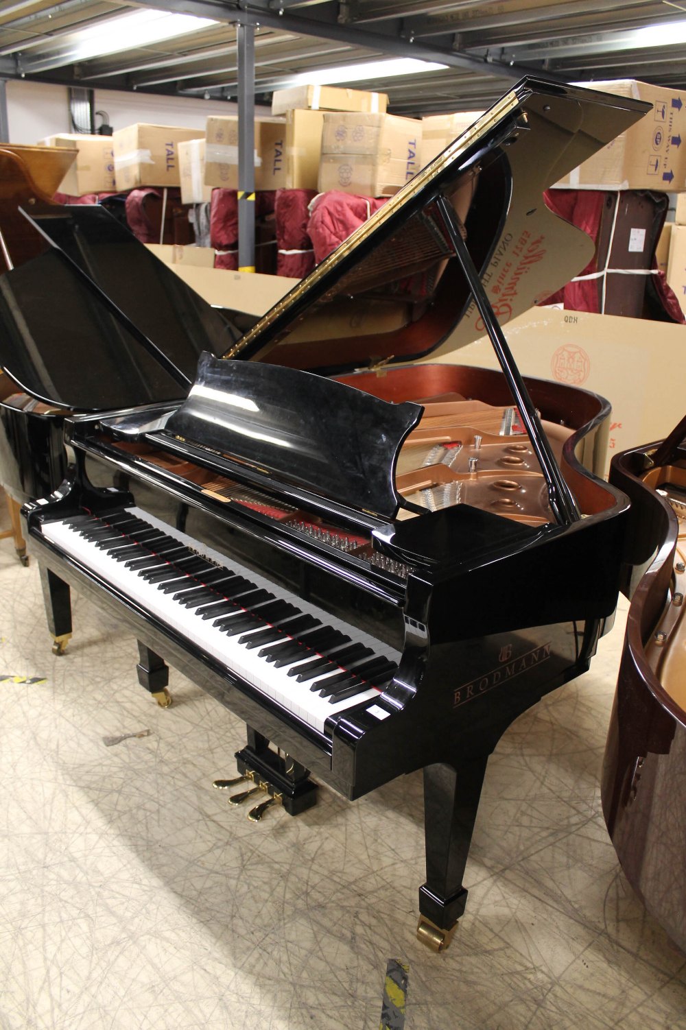 Brodmann (c2008) A 6ft 1in Model 187 grand piano in a bright ebonised case on square tapered