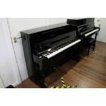 Kawai (c2001) A Model CX-5H upright piano in a bright ebonised case;