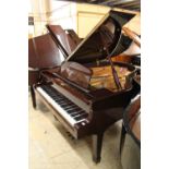 Yamaha (c2002) A 6ft 1in Model C3 grand piano in a bright mahogany case on square tapered legs.
