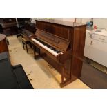Kemble (c2007) A Chopin Model upright piano in a bright mahogany and crossbanded case;