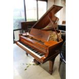 Steinway (c1908) A 5ft 10in Model O grand piano in a rosewood case on square tapered legs.