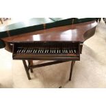 John Morley (c1964) A wing spinet in a mahogany case on a trestle base.