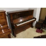 Bechstein An overstrung and underdamped upright piano in a rosewood case.