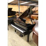 Yamaha (c2001) A 5ft 8in Model C2 grand piano in a bright ebonised case on square tapered legs;