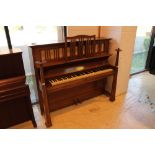 Bechstein (c1907) An upright piano in an Arts & Crafts mahogany case with extended front candle