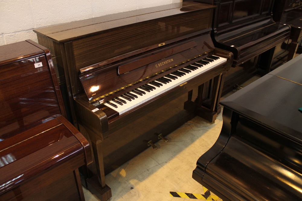Bechstein (c1988) A Model 12 upright piano in a bright mahogany case;