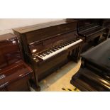 Bechstein (c1988) A Model 12 upright piano in a bright mahogany case;