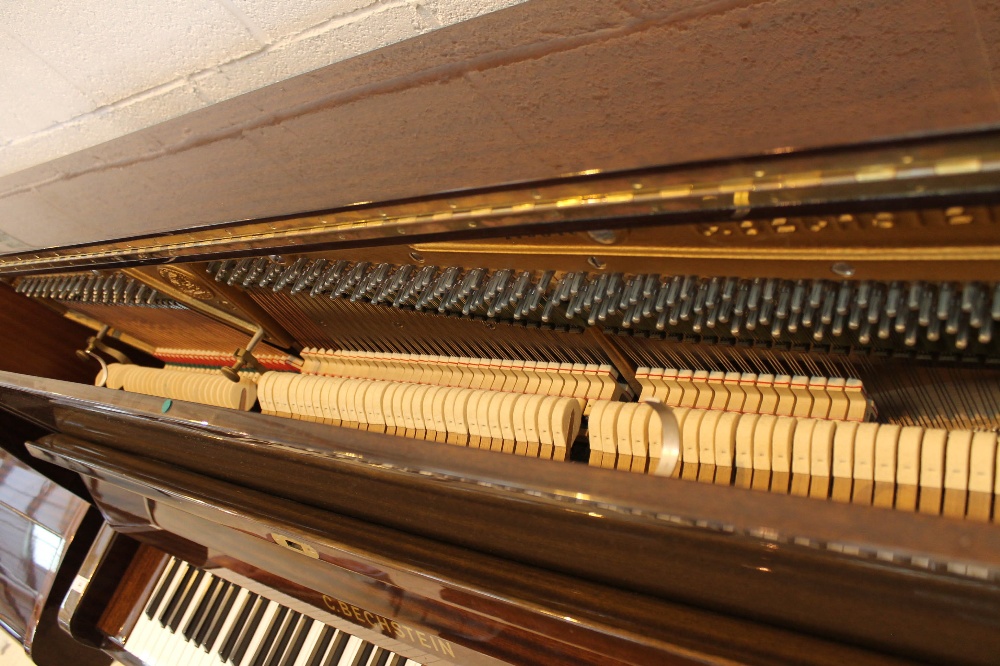 Bechstein (c1988) A Model 12 upright piano in a bright mahogany case; - Image 4 of 5