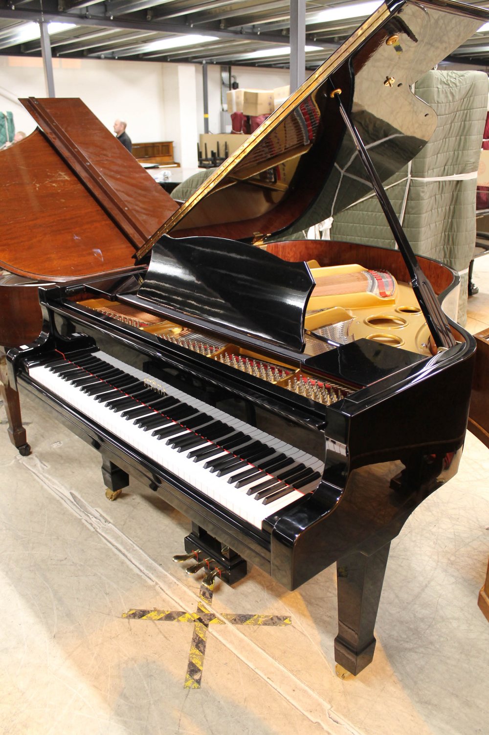 Estonia (c2004) A 5ft 6in Model 168 grand piano in a bright ebonised case on square tapered legs;