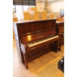 Steinbach (c1920s) An upright piano in a traditional mahogany case.