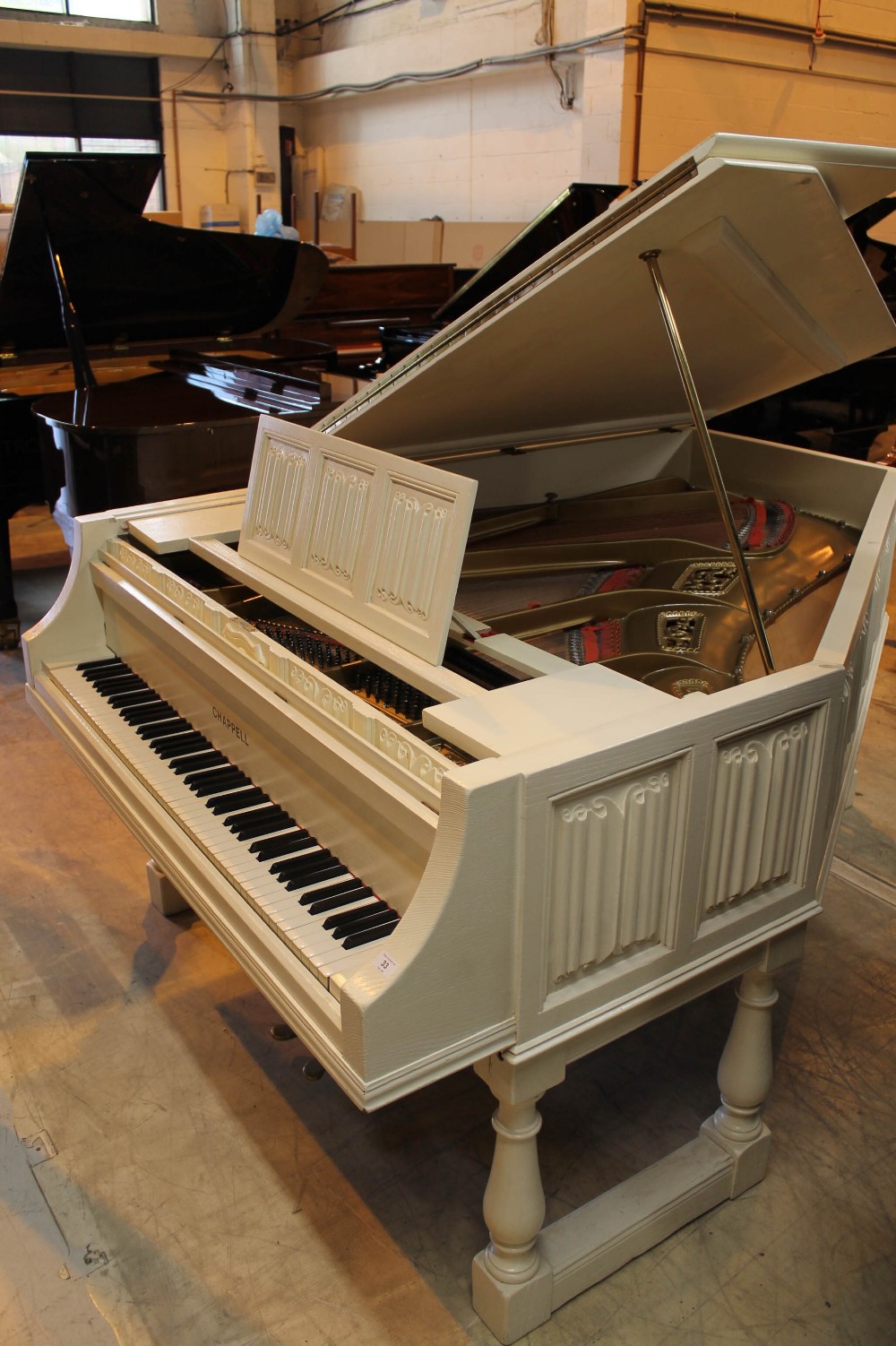 Chappell (late 19th century) A 7ft grand piano in a later white painted case,