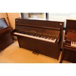 Yamaha (c2000) A Model MP70N upright piano in a satin mahogany case.