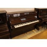 Bechstein (c1979) An upright piano in a modern style bright mahogany case