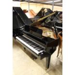 Kawai (c1996) A 5ft 10in grand piano in a bright ebonised case on square tapered legs.