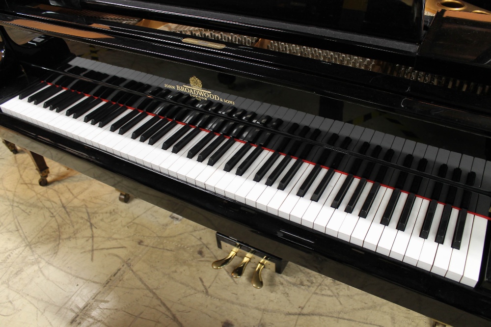 Broadwood A recent 6ft 3in grand piano in a bright ebonised case on square tapered legs. - Image 2 of 10