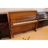 Welmar (c1995) A 121cm upright piano in a traditional mahogany case;