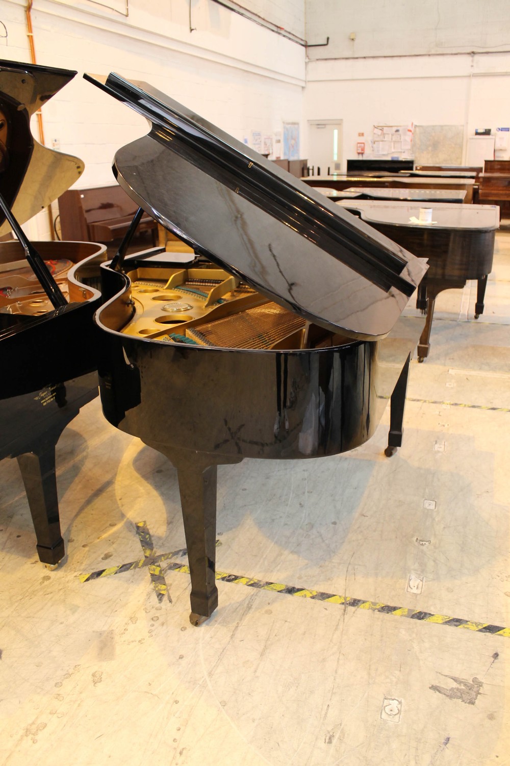 Weinbach (c1991) A 6ft 4in grand piano in a bright ebonised case on square tapered legs. - Image 7 of 8