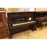 Steinway (c1902) A Style 1 upright piano in a rosewood case.