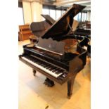 Steinway (c1902) A 7ft 5in Model C grand piano in a bright ebonised case on square tapered legs;