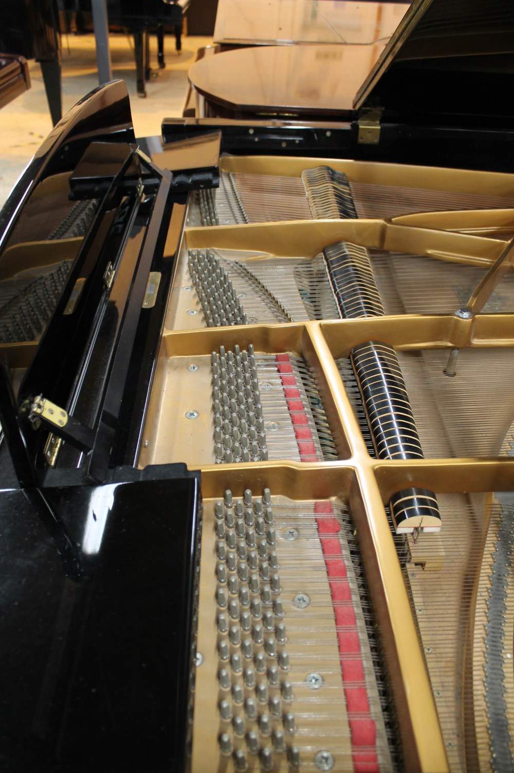 Broadwood A recent 6ft 3in grand piano in a bright ebonised case on square tapered legs. - Image 5 of 10