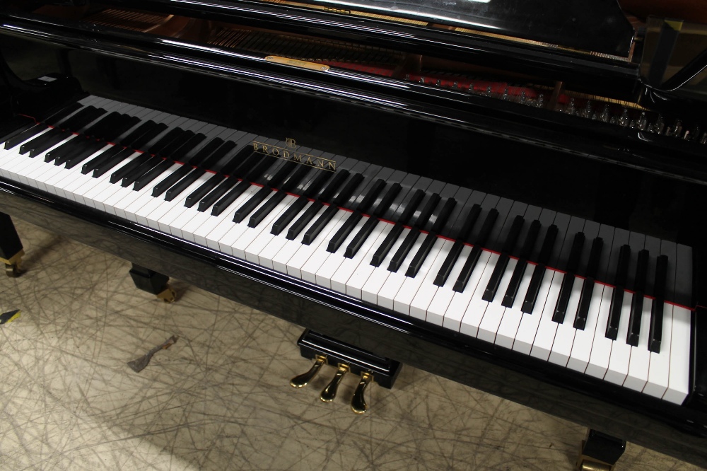 Brodmann (c2008) A 6ft 1in Model 187 grand piano in a bright ebonised case on square tapered - Image 2 of 6