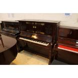 Bechstein (c1880) An Arts and Crafts upright piano in a mahogany case with brass strapwork