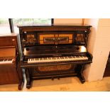 Steinway (c1882) An upright piano in an ebonised and satinwood case in the Aesthetic style,