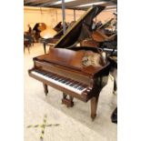 Steinway (c1936) A 5ft 7in Model M grand piano in a mahogany case on square tapered legs.