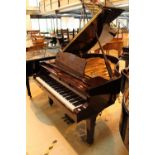 Yamaha (c2000) A 5ft 3in Model C1 grand piano in a bright mahogany case on square tapered legs.