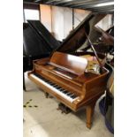 Steinway (c1907) A 5ft 10in Model O grand piano in a rosewood case on square tapered legs.