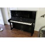 Yamaha (c2016) A Model SU7 131cm upright piano in a bright ebonised case.