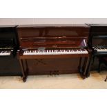 Petrof (c1997) A 118cm upright piano in a bright mahogany case; together with a stool.