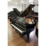 Boston (c2003) A 5ft 4in Model GP163 grand piano in a bright ebonised case on square tapered legs;