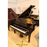 Yamaha (c1974) A 6ft 1in Model C3 grand piano in a bright ebonised case on square tapered legs;