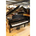 Kawai (c1989) A 6ft 1in Model GS-40 grand piano in a bright ebonised case on square tapered legs.