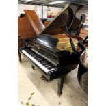 Yamaha (c1991) A 6ft 1in Model C3 grand piano in a bright ebonised case on square tapered legs.