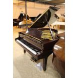Yamaha (c1994) A 5ft 7in Model G2 grand piano in a bright mahogany case on square tapered legs.