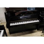 Bechstein (c1981) A Model 12N upright piano in a bright ebonised case;