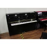 Yamaha (c2008) A Model B1-PE upright piano in a bright ebonised case;