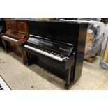 Bösendorfer (c1929) An upright piano in an ebonised case.