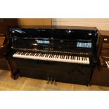 Yamaha (c2000) A Model C110A upright piano in a modern style bright ebonised case;