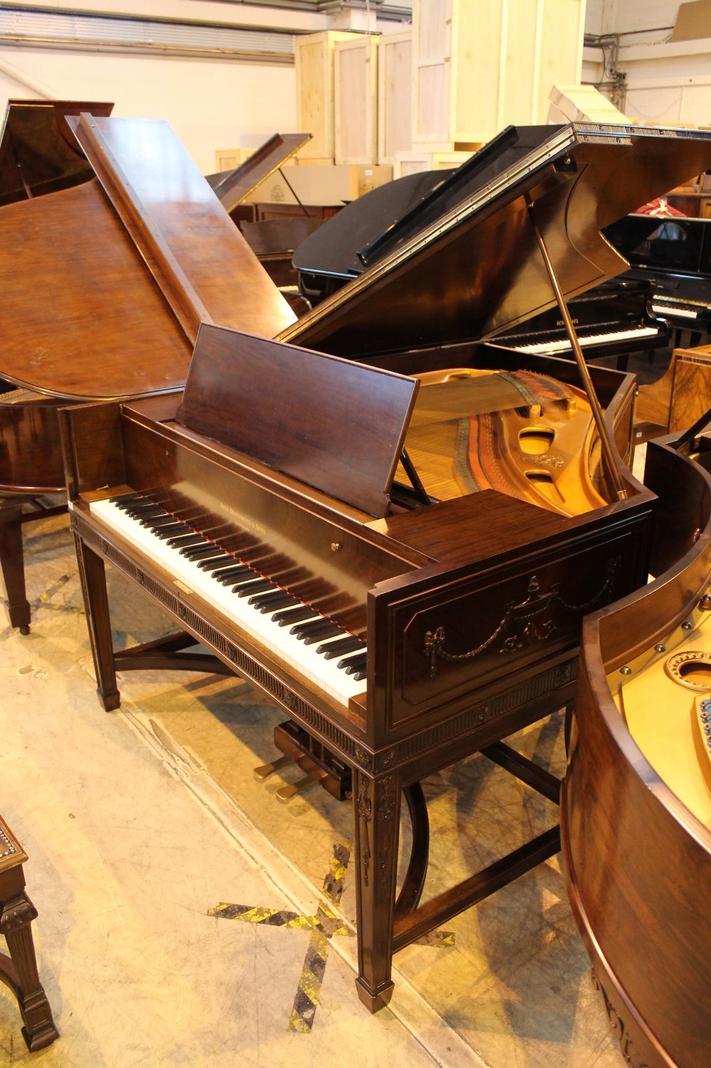 Broadwood & Sons (c1925) A 5ft 7in barless grand piano in an Adams style carved mahogany case,