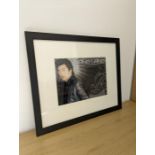 Lang Lang A signed coloured photograph, signature in felt tip pen. Image size 26cm x 19cm, in an