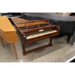 Elwerkemper Grand Piano (c1820) A Viennese grand piano in a mahogany and walnut case on three turned